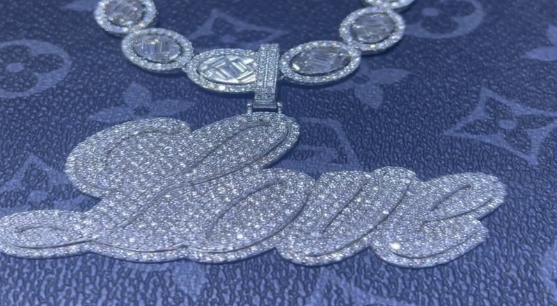 Diddy gets Yung Miami iced out "Love" chain 