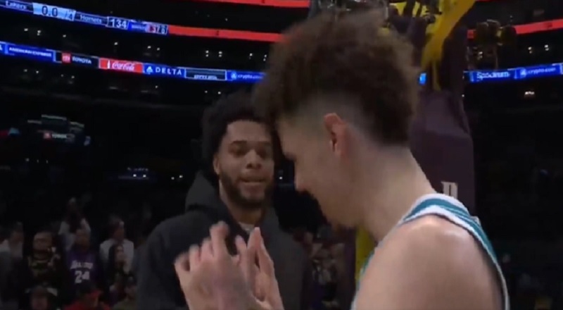 LaMelo Ball celebrates with Miles Bridges after Hornets beat Lakers