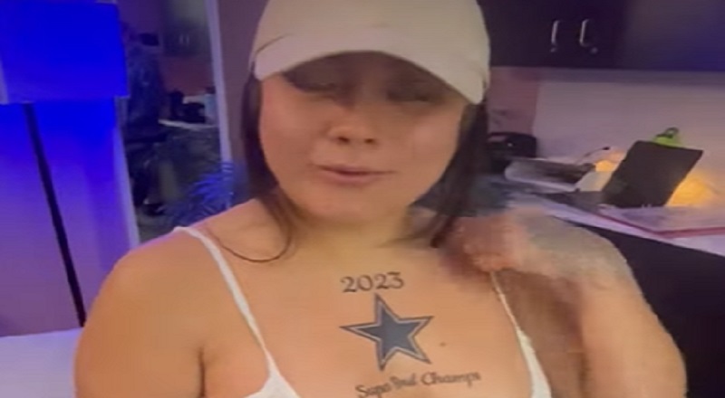 Woman tattoos Dallas Cowboys 2023 championship on her chest