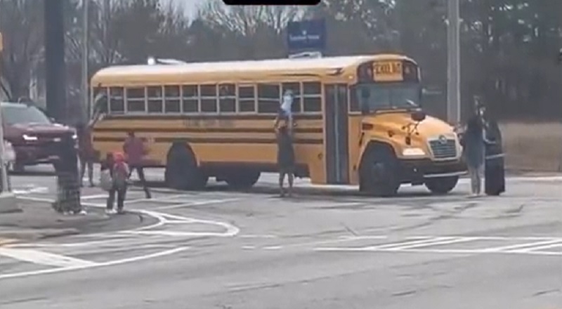 Kids climb out school bus window after driver refuses to open door
