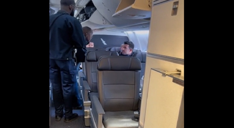 White man removed from airplane by Black security guards