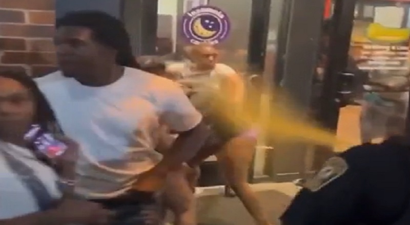 Cop sprays mace on a group of Black girls and walks off