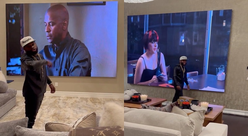 Floyd Mayweather shows off his massive TV inside his mansion