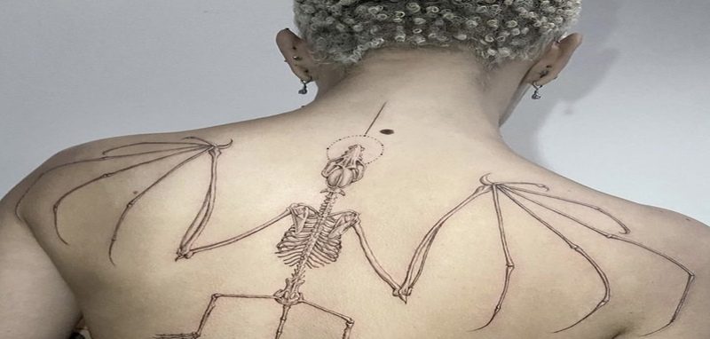 Doja Cat shows off large ba skeleton tattoo on her back