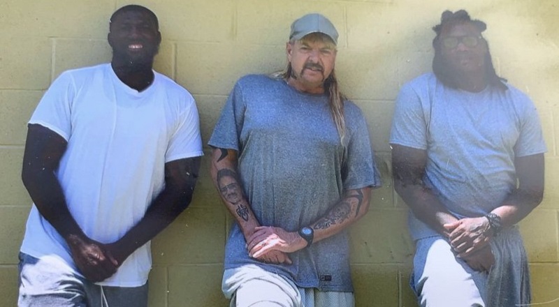Joe Exotic's prison photo with two guys on the yard goes viral