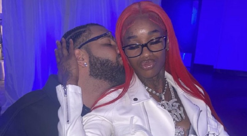 Drake kisses Sexxy Red on the neck in the club