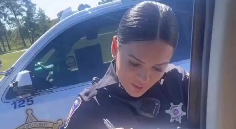 Attractive female cop pulls over a man and he flirts with her