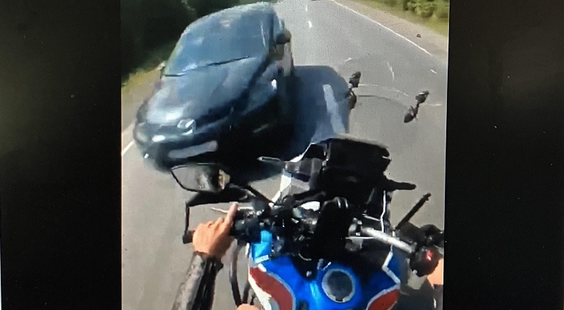 Barefoot man riding motorcycle breaks his foot in head-on wreck