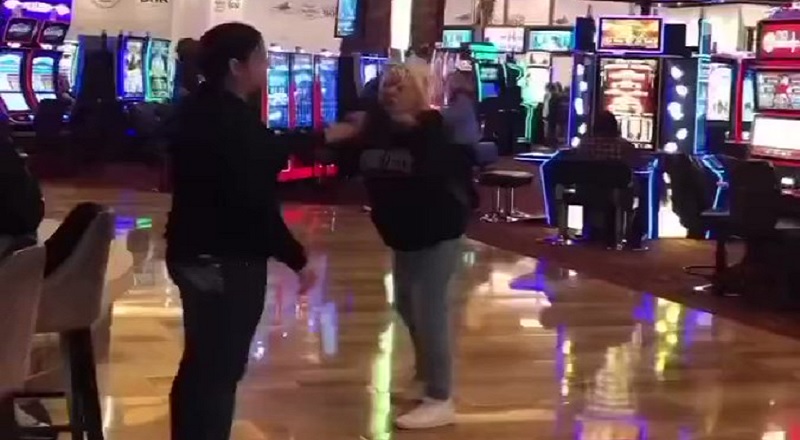 Woman in casino knocks out another woman with one punch